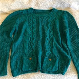 Green knitted sweater